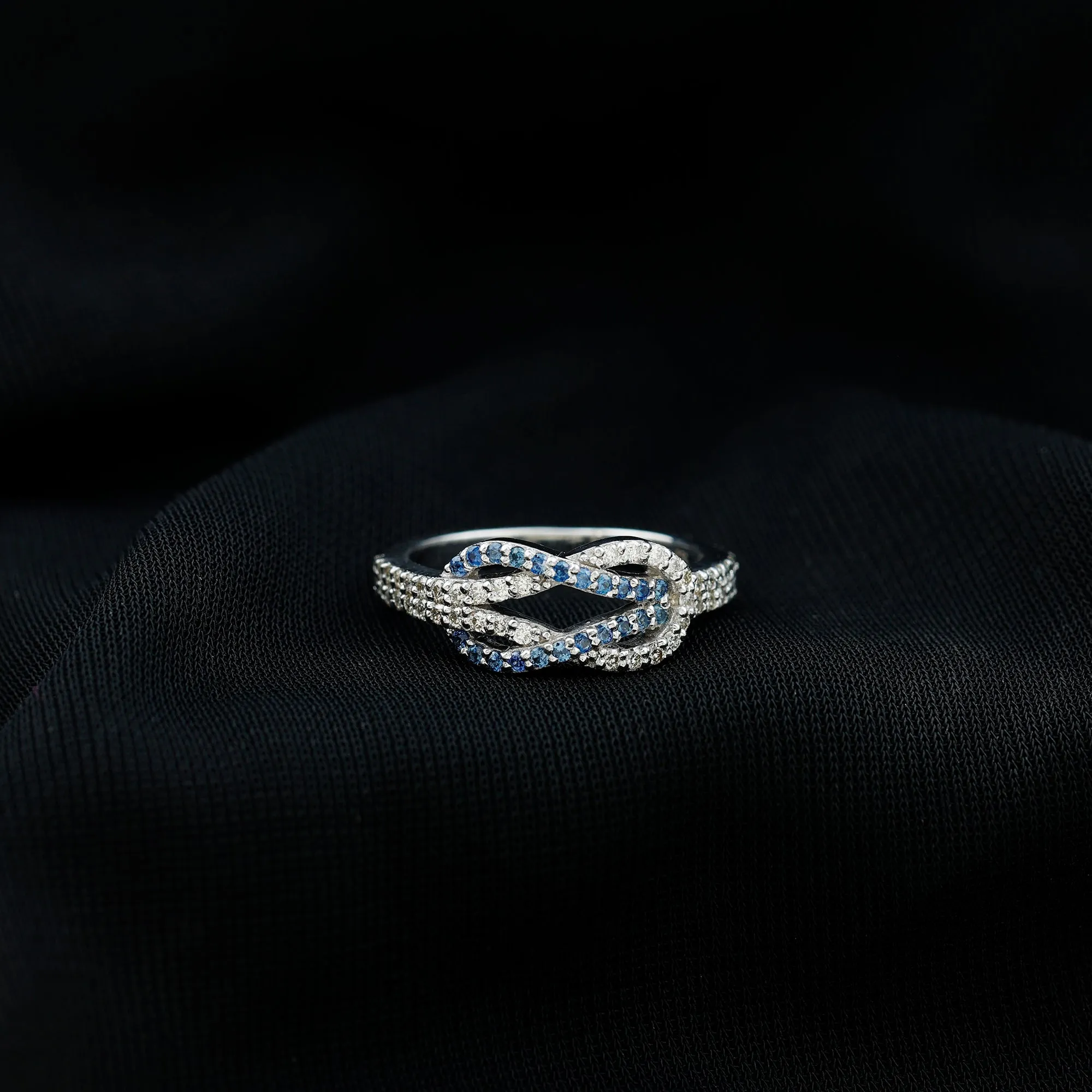 Blue Sapphire And Diamond Interlock Infinity Ring