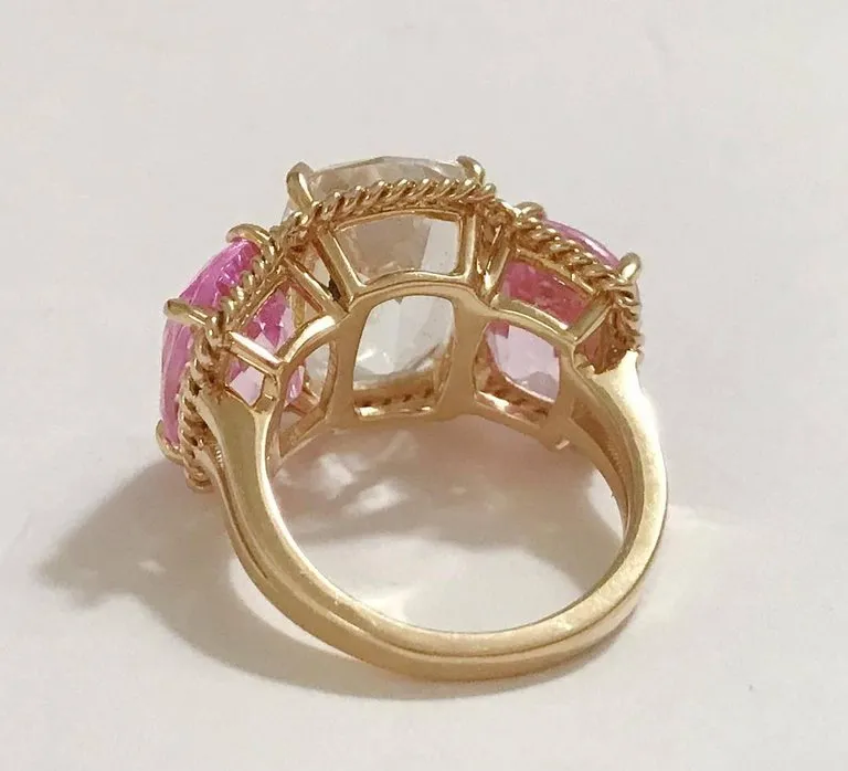 Elegant Three-Stone Rock Crystal and Pink Topaz Ring with Gold Rope Twist Border