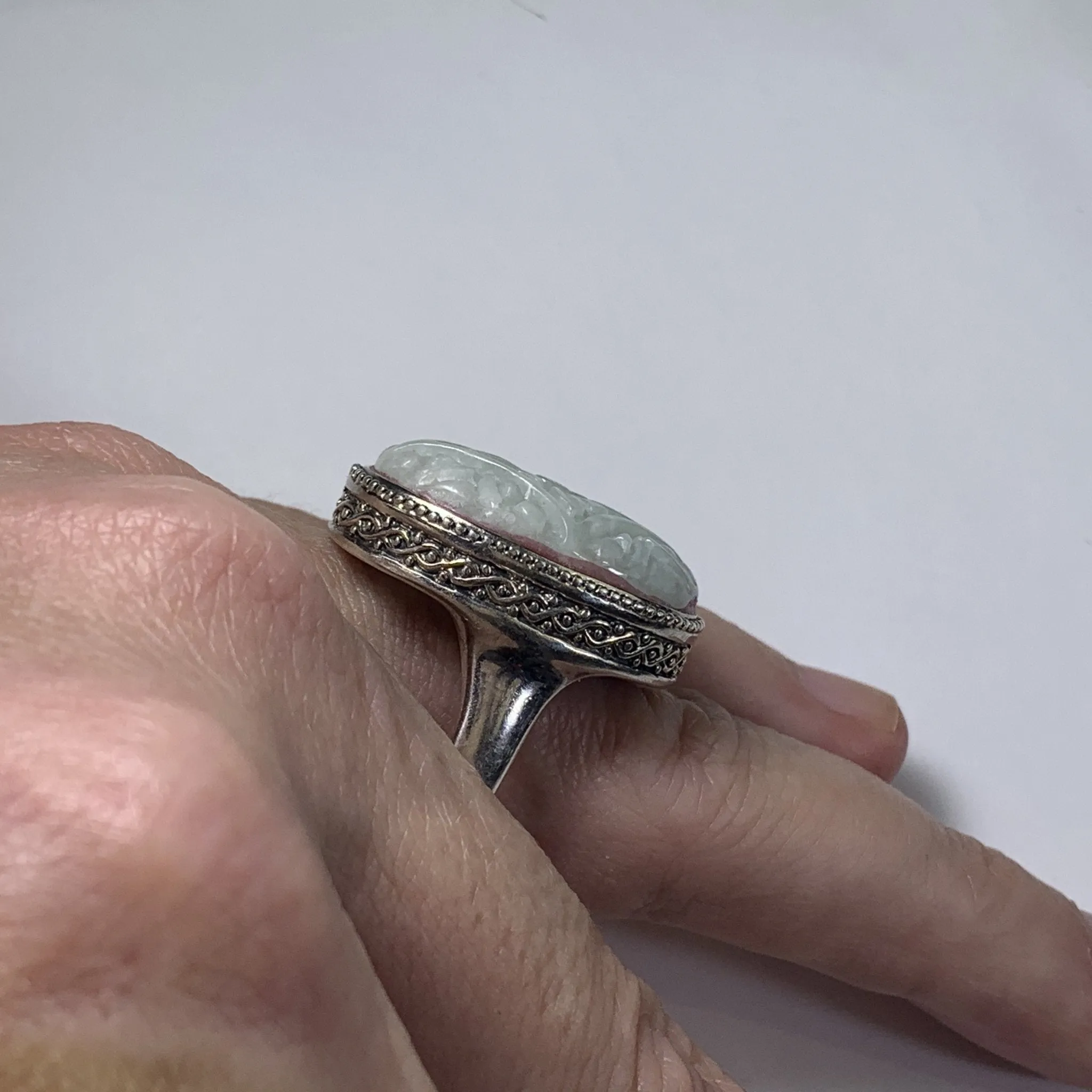 Vintage Jade Statement Ring in a Milgrain Sterling Silver Setting. Light Green Jade has Floral Etching.