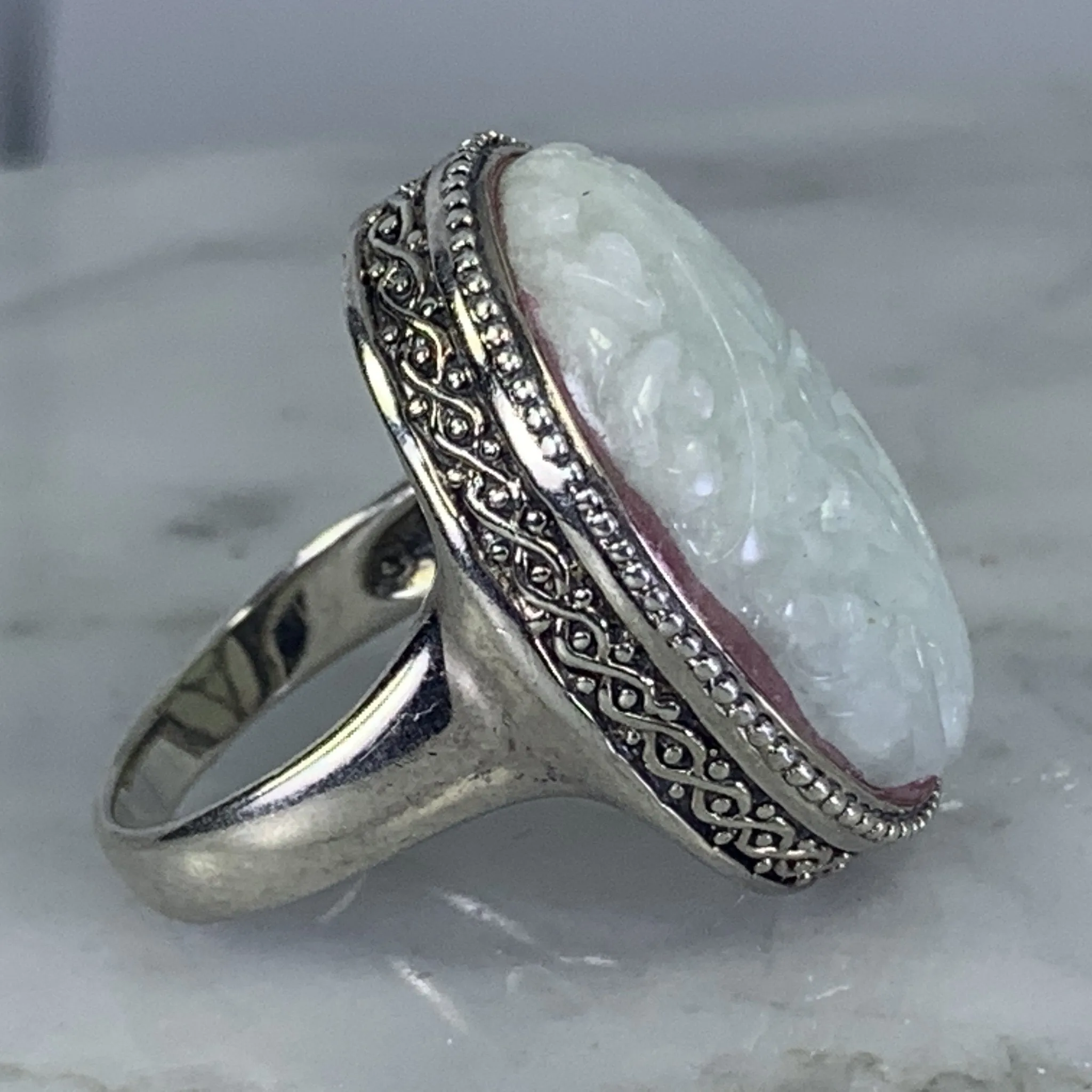 Vintage Jade Statement Ring in a Milgrain Sterling Silver Setting. Light Green Jade has Floral Etching.