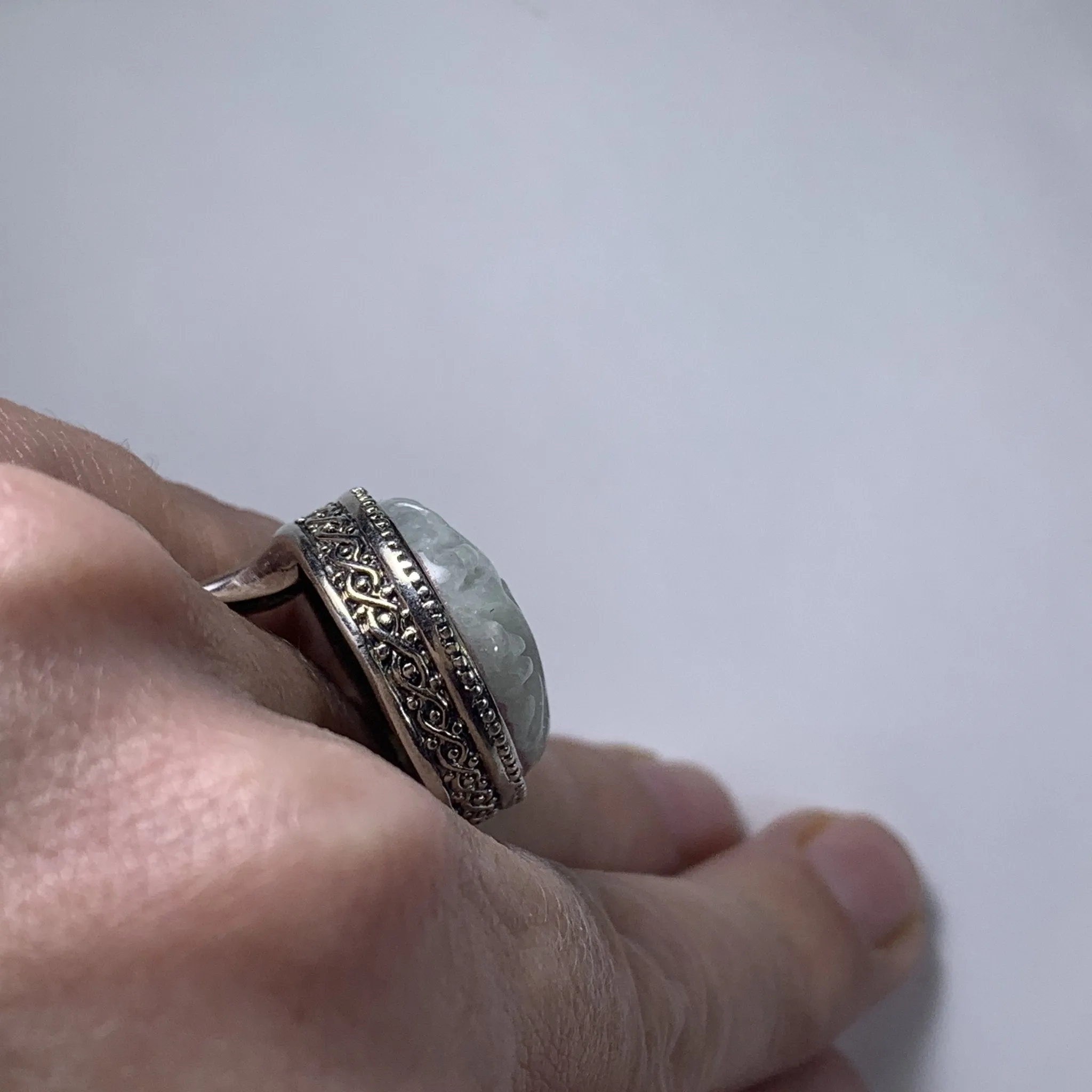 Vintage Jade Statement Ring in a Milgrain Sterling Silver Setting. Light Green Jade has Floral Etching.